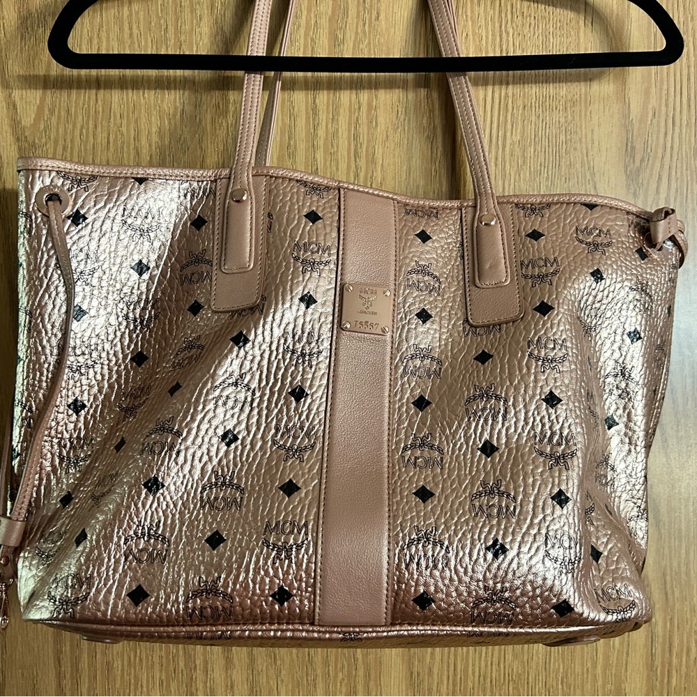 MCM rose gold reversible bag.